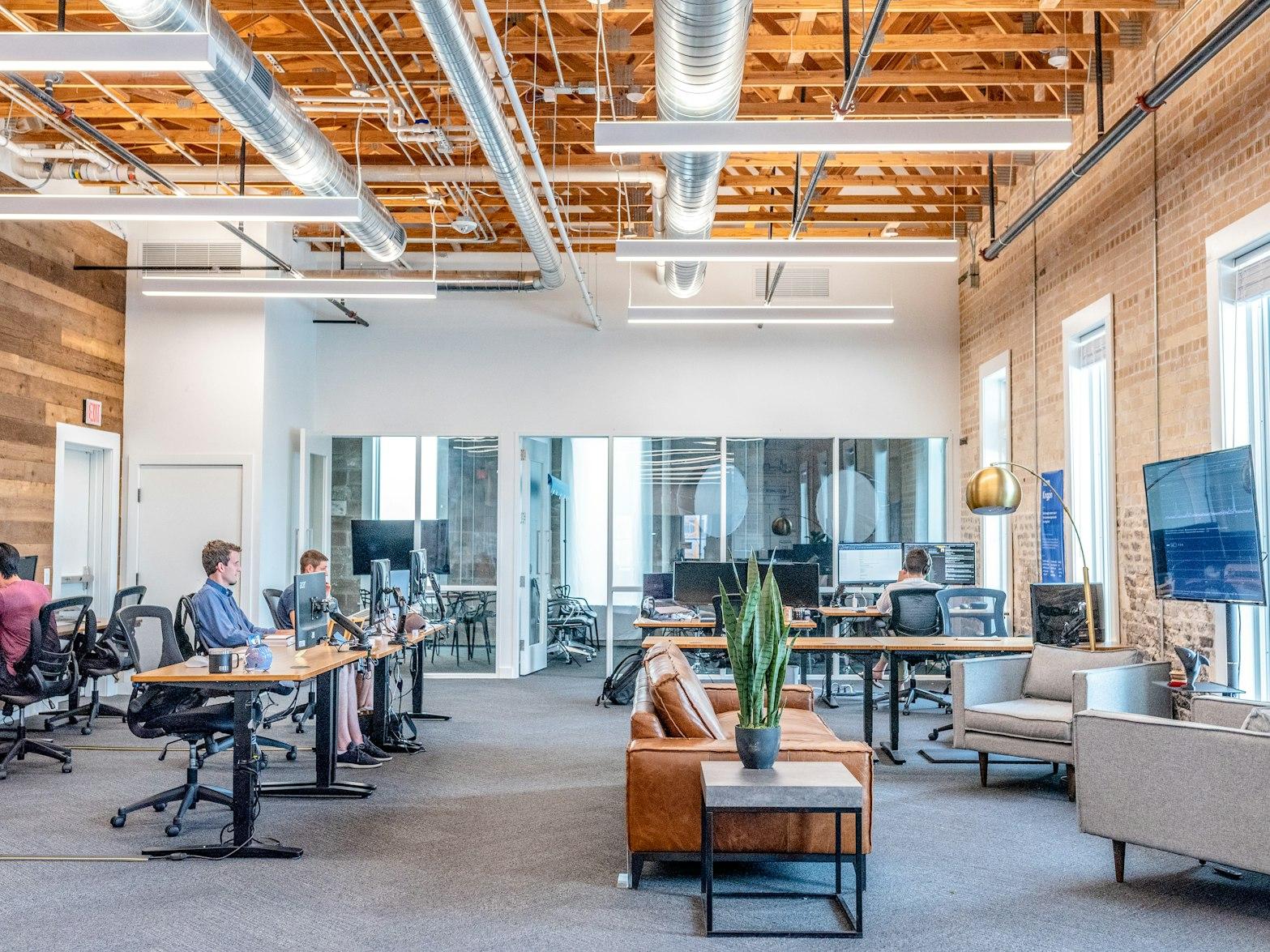 Office with people raising capital through crowdfunding